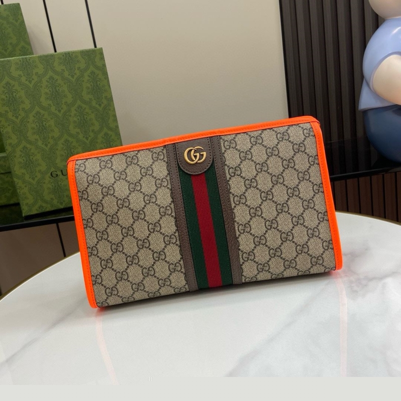 G*u*i clutch bags